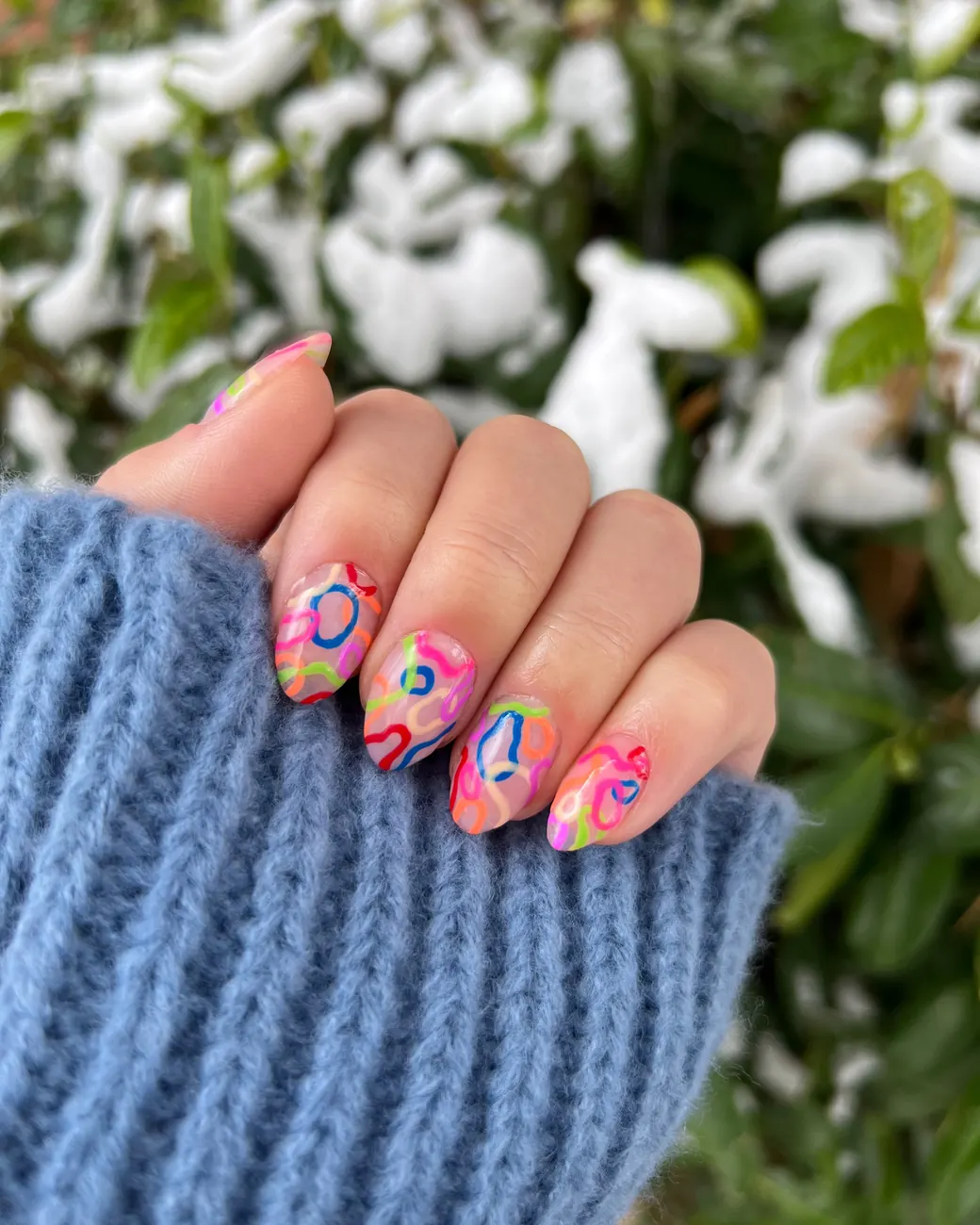 Neon Swirl: bright neon swirls in pink, yellow and blue