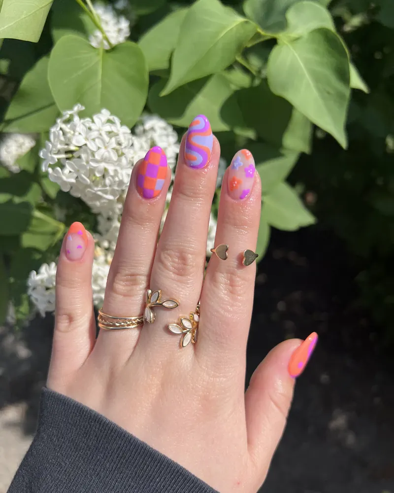 Pink Groove: pink and purple swirls with checkered accents